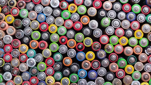 Different Types of Used Batteries in a Heap Top View