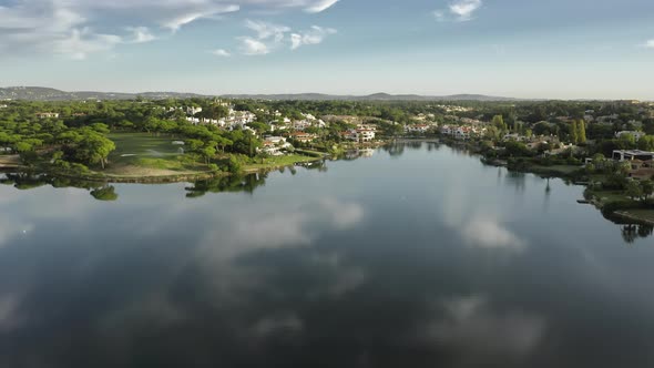 Water Surface of Quinta Do Lago with Houses on Coastline Algarve Portugal