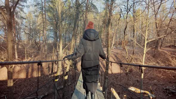 Wanderlust Travel Searching Right Direction. Legs Walking On Suspension Wooden Bridge.