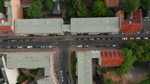 Aerial Birds Eye Overhead Top Down View of Bike Highway Leading Through Urban Neighbourhood