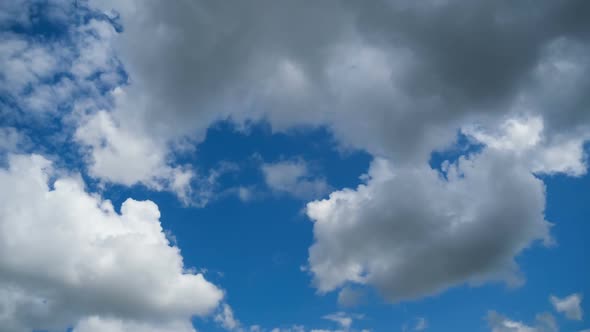 Clouds Move Smoothly in the Blue Sky. Timelapse