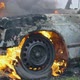 Burning Car Tires, the Car Burns a Wheel, a Completely Burnt Out Car - VideoHive Item for Sale