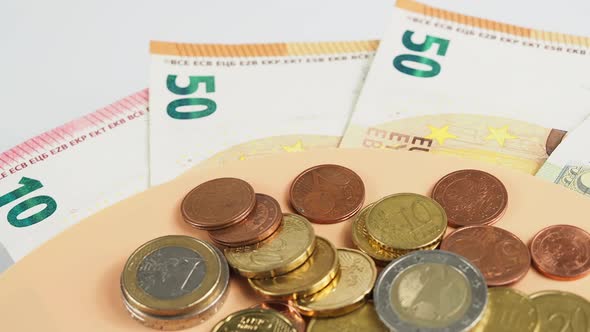 Euro bills and coins. Cash. The concept of savings.