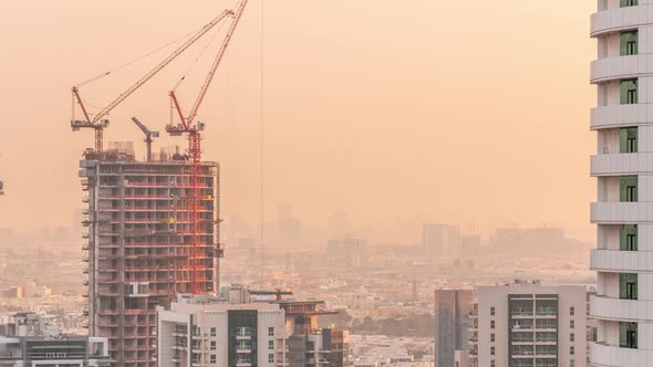 Cranes Working on Modern Constraction Site Works of New Skyscraper Timelapse