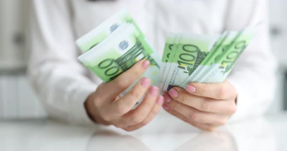 Woman Counting Euro Currency Banknotes in Office Closeup  Movie