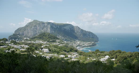 Beautiful view of Capri and Monte Solaro form Villa Jovis during a sunny day in Summer