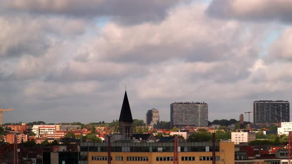 Panning Timelapse of Clouds passing Over City