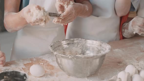 Unrecognizable Children Kneading Dough