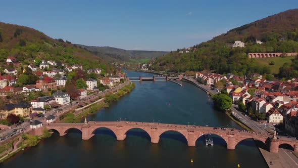 Pedestrian bridge over the river. Beautiful top view of the Heidelberg castle.