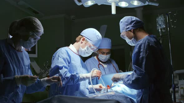 Surgeons Working in Operating Room