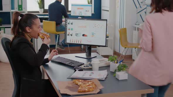 Entrepreneur Woman Having Meal Break Sitting at Table Eating Pizza Slice Fastfood Delivery
