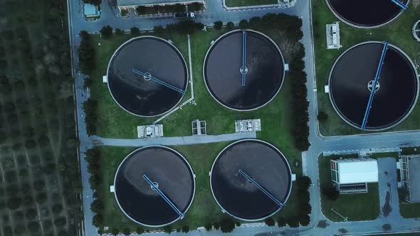 Sewage treatment plant in green fields. Grey water recycling.