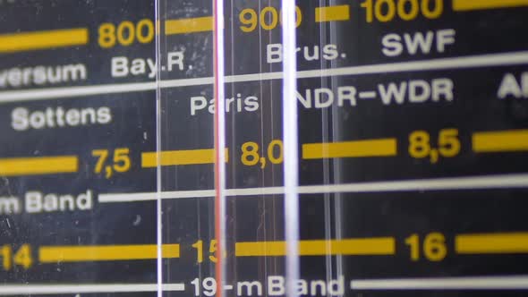 Tuning Analog Radio Dial Frequency on Scale of the Vintage Receiver