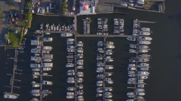 Top Down Rising Aerial Shot of Boats Docked at a Marina in Port Washington