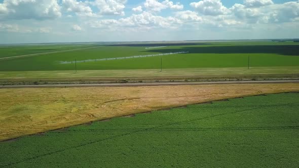 Calm Aerial Landscape of Green and Golden Agricultural Fields