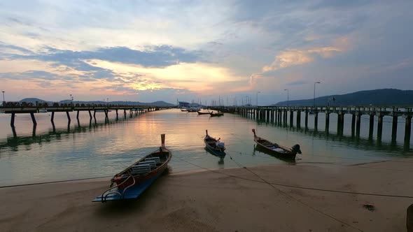 Time Lapse Sunrise With Sweet Light Rays And Other Atmospheric Effects Above Chalong Pier.