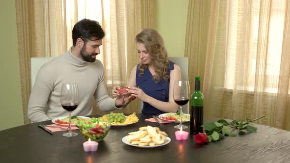 Man Giving Present To Woman