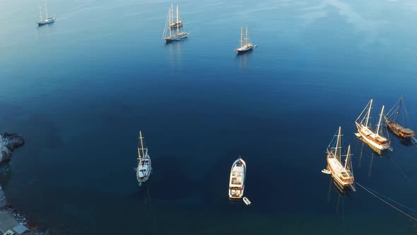 Slow Rising Shot Over Yachts in Port Showing Offshore