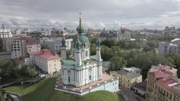 The Architecture of Kyiv. Ukraine. St. Andrew's Church. Aerial. Slow Motion, Gray, Flat