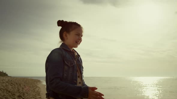 Happy Girl Smiling Enjoying Sea Beach in Morning