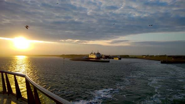 leaving the island at sunset with a view on the dock and birds flying by