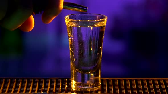 Bartender Continue Making, Pouring Cocktail with White Alcohol Liquid, Shots, Slow Motion