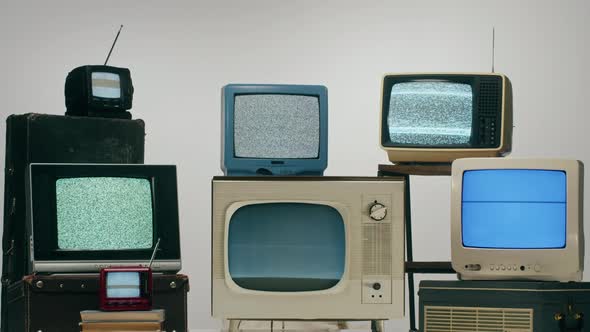 Old Televisions with Grey Interference Screen on Light Background