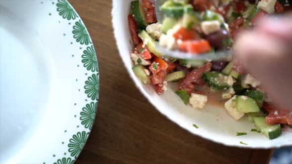 Cinematic Serving Salad from bowl to plate