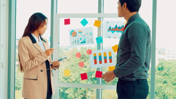 Business People Work on Project Planning Board