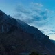 Steep mountain range during the period from day to night and moving clouds. - VideoHive Item for Sale