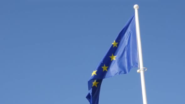 Blue  yellow with stars European Union flag waving on wind in slow motion 1920X1080 HD footage - Eu 