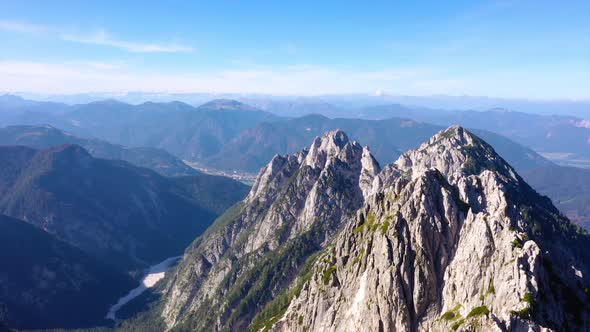 Drone flight over a mountain range in the Julian Alps, Mangart, Triglav National Park