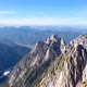 Drone flight over a mountain range in the Julian Alps, Mangart, Triglav National Park - VideoHive Item for Sale