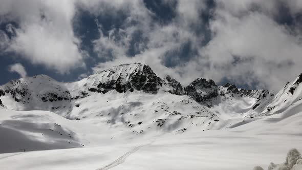 High Altitude Rocky Snowy Sharp Mountain Ridge in Terrestrial Winter Climate