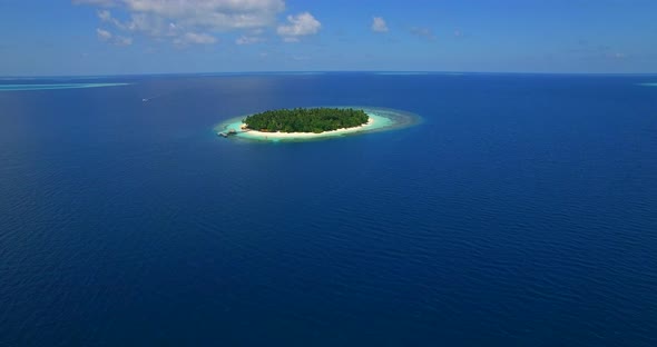 Aerial drone view of scenic tropical islands in the Maldives.