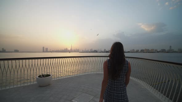 Woman Enjoying Dubai Skyline in the Sunset