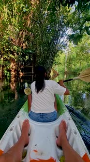 Couple in Kayak in the Jungle of Krabi Thailand Men and Woman in Kayak at a Tropical Jungle in Krabi