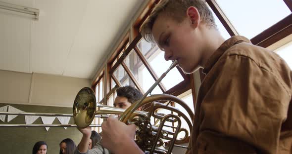 Teenage musicians rehearsing