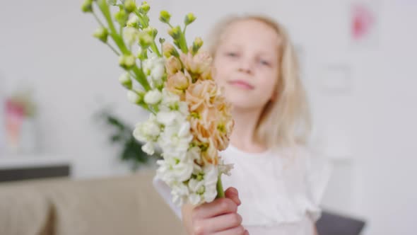 Cute Blond Girl with Flowers