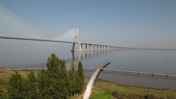 Flying over the longest bridge in Europe - Vasco da Gama in Lisbon, Portugal