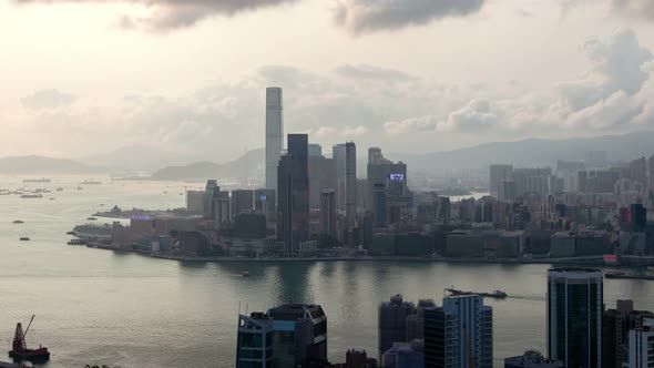 Hong Kong Urban Cityscape Aerial Skyline Panorama Timelapse at Day Pan Up