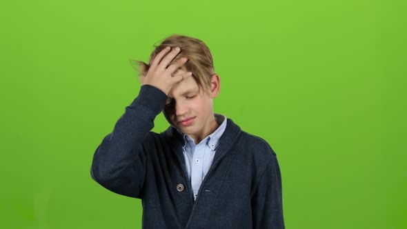 Child Is Tormented By Severe Headaches. Green Screen