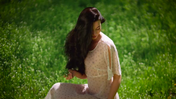 Woman Gathering Flowers