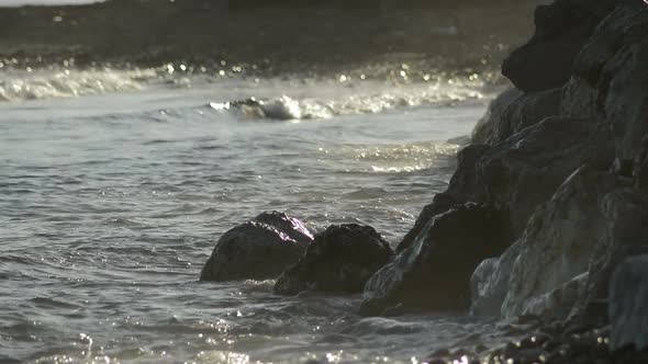 Sea Waves Breaking against the Rocks