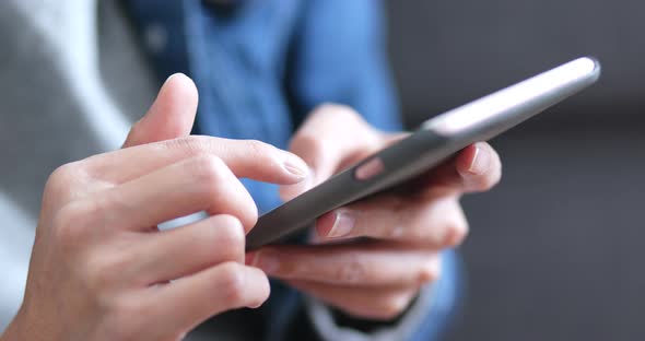 Woman using smart phone