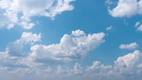 Clouds Move Rapidly Against Blue Sky Bright Sunny Day