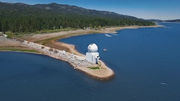 Drone moves around Big Bear Solar observatory, Big Bear Lake, California, USA