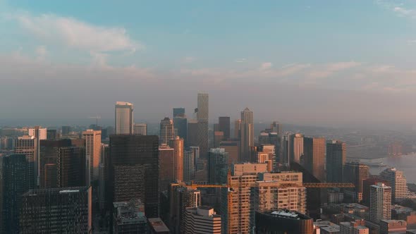 Aerial of Seattle's skyscrapers during golden hour sunset