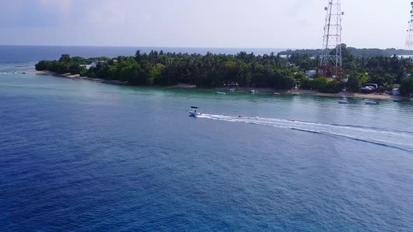 Close up tourism of resort beach by water with sand background near sandbank