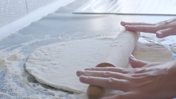 Rolls Out Pizza Dough